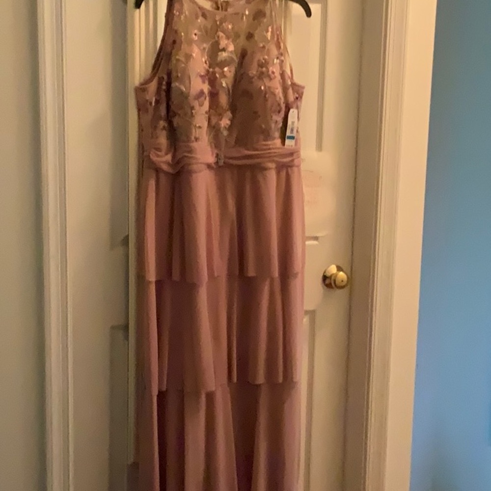 Women’s beautiful long tiered dress. New with tag. Never worn.